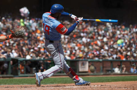 SAN FRANCISCO, CA – AUGUST 26: Jurickson Profar #19 of the Texas Rangers at bat against the San Francisco Giants during the fourth inning at AT&T Park on August 26, 2018 in San Francisco, California. The San Francisco Giants defeated the Texas Rangers 3-1. All players across MLB will wear nicknames on their backs as well as colorful, non-traditional uniforms featuring alternate designs inspired by youth-league uniforms during Players Weekend. (Photo by Jason O. Watson/Getty Images)