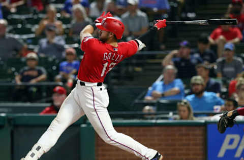 ARLINGTON, TX – SEPTEMBER 03: Joey Gallo #13 of the Texas Rangers hits for an RBI double in the seventh inning against the Los Angeles Angels at Globe Life Park in Arlington on September 3, 2018 in Arlington, Texas. (Photo by Richard Rodriguez/Getty Images)