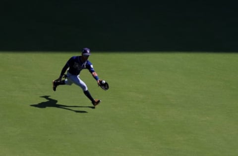 ARLINGTON, TX – SEPTEMBER 19: Mallex Smith #0 of the Tampa Bay Rays fields a fly ball against the Texas Rangers in the bottom of the sixth inning at Globe Life Park in Arlington on September 19, 2018 in Arlington, Texas. (Photo by Tom Pennington/Getty Images)