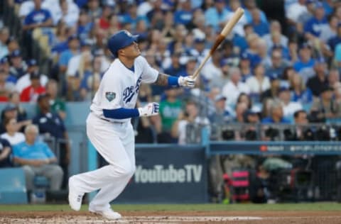 LOS ANGELES, CA – OCTOBER 27: Manny Machado #8 of the Los Angeles Dodgers hits a fly ball out to right field in Game Four of the 2018 World Series against the Boston Red Sox at Dodger Stadium on October 27, 2018 in Los Angeles, California. (Photo by Sean M. Haffey/Getty Images)