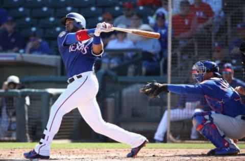 SURPRISE, ARIZONA – FEBRUARY 27: Elvis Andrus #1 of the Texas Rangers hits a double against the Chicago Cubs during the first inning of the MLB spring training game at Surprise Stadium on February 27, 2019 in Surprise, Arizona. (Photo by Christian Petersen/Getty Images)