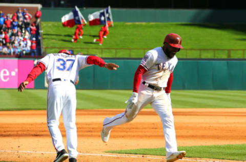 ARLINGTON, TX – MARCH 31: Tony Beasley #37 of the Texas Rangers congratulates Delino DeShields #3 for hitting a stand slam in the fourth inning against the Chicago Cubs at Globe Life Park in Arlington on March 31, 2019 in Arlington, Texas. (Photo by Rick Yeatts/Getty Images)