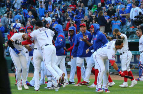 ARLINGTON, TX – MARCH 31: Joey Gallo #13 of the Texas Rangers runs in to score and celebrates with his team mates to end the game against the Chicago Cubs at Globe Life Park in Arlington on March 31, 2019 in Arlington, Texas. (Photo by Rick Yeatts/Getty Images)