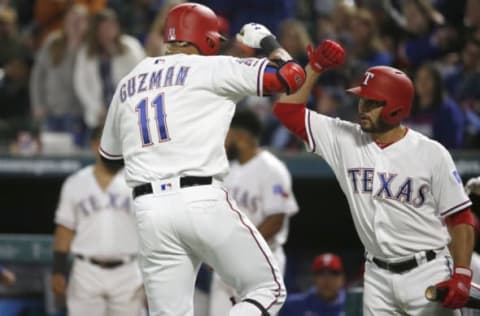 ARLINGTON, TX – APRIL 1: Ronald Guzman #11 and Isiah Kiner-Falefa #9 of the Texas Rangers celebrate after Guzman’s solo home run against the Houston Astros during the third inning at Globe Life Park in Arlington on April 1, 2019 in Arlington, Texas. (Photo by Ron Jenkins/Getty Images)