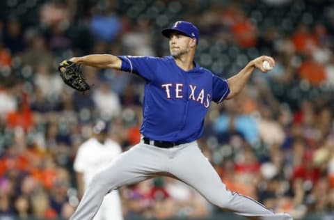 HOUSTON, TEXAS – MAY 09: Mike Minor #23 of the Texas Rangers pitches in the first inning against the Houston Astros at Minute Maid Park on May 09, 2019 in Houston, Texas. (Photo by Bob Levey/Getty Images)