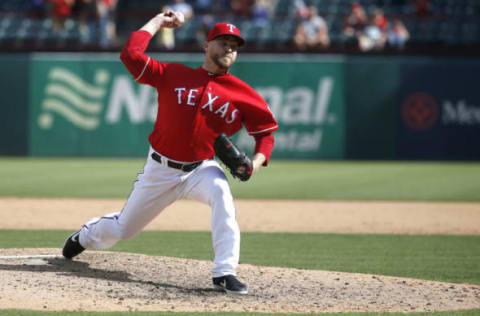 ARLINGTON, TX – JUNE 23: Shawn Kelley #27 of the Texas Rangers throws against the Chicago White Sox during the ninth inning at Globe Life Park in Arlington on June 23, 2019 in Arlington, Texas. The Rangers won 7-4. (Photo by Ron Jenkins/Getty Images)