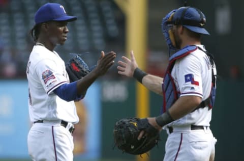 ARLINGTON, TX – AUGUST 4: Rafael Montero #48 and Jeff Mathis #2 of the Texas Rangers celebrate the teams 9-4 win over the Detroit Tigers at Globe Life Park in Arlington on August 4, 2019 in Arlington, Texas. (Photo by Ron Jenkins/Getty Images)