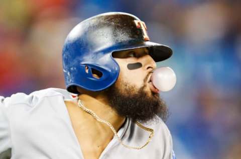 TORONTO, ONTARIO – AUGUST 12: Rougned Odor #12 of the Texas Rangers blows a bubble gum bubble after hitting a home run against the Toronto Blue Jays in the seventh inning during their MLB game at Rogers Centre on August 12, 2019 in Toronto, Canada. (Photo by Mark Blinch/Getty Images)