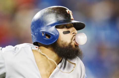 TORONTO, ONTARIO – AUGUST 12: Rougned Odor #12 of the Texas Rangers blows a bubble gum bubble after hitting a home run against the Toronto Blue Jays in the seventh inning during their MLB game at Rogers Centre on August 12, 2019 in Toronto, Canada. (Photo by Mark Blinch/Getty Images)