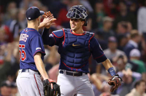 BOSTON, MASSACHUSETTS – SEPTEMBER 05: Taylor Rogers #55 of the Minnesota Twins and Jason Castro #15 celebrate after defeating the Boston Red Sox 2-1 at Fenway Park on September 05, 2019 in Boston, Massachusetts. (Photo by Maddie Meyer/Getty Images)