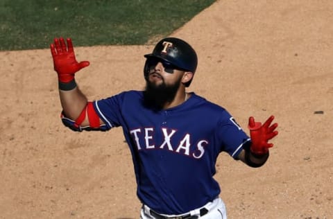 ARLINGTON, TEXAS – SEPTEMBER 26: Rougned Odor #12 of the Texas Rangers celebrates a homerun in the seventh inning against the Boston Red Sox at Globe Life Park in Arlington on September 26, 2019 in Arlington, Texas. (Photo by Ronald Martinez/Getty Images)