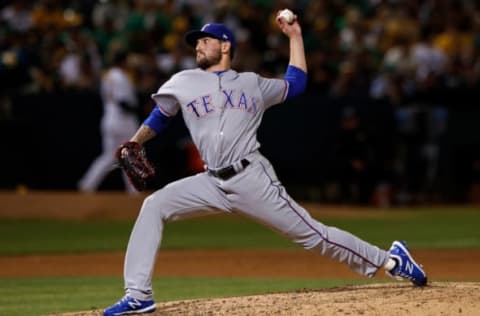 OAKLAND, CA – SEPTEMBER 21: Joe Palumbo #62 of the Texas Rangers pitches against the Oakland Athletics during the sixth inning at the RingCentral Coliseum on September 21, 2019 in Oakland, California. The Oakland Athletics defeated the Texas Rangers 12-3. (Photo by Jason O. Watson/Getty Images)