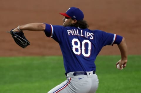 ARLINGTON, TEXAS – JULY 07: Tyler Phillips #80 of the Texas Rangers throws the ball in a intrasquad game during Major League Baseball summer workouts at Globe Life Field on July 07, 2020 in Arlington, Texas. (Photo by Ronald Martinez/Getty Images)