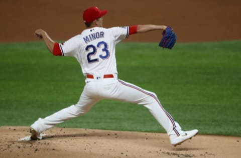 ARLINGTON, TEXAS – AUGUST 11: Mike Minor #23 of the Texas Rangers throws against the Seattle Mariners in the first inning at Globe Life Field on August 11, 2020 in Arlington, Texas. (Photo by Ronald Martinez/Getty Images)