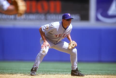 NEW YORK – CIRCA 2001: Alex Rodriguez #3 of the Texas Rangers is down and ready to make a play on the ball against the New York Yankees during an Major League Baseball game circa 2001 at Yankee Stadium in the Bronx borough of New York City. Rodriguez played for the Rangers from 2001-03. (Photo by Focus on Sport/Getty Images)