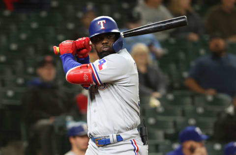 SEATTLE, WASHINGTON - MAY 27: Adolis Garcia #53 of the Texas Rangers reacts while at bat during the seventh inning against the Seattle Mariners at T-Mobile Park on May 27, 2021 in Seattle, Washington. (Photo by Abbie Parr/Getty Images)