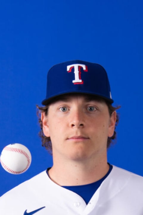 SURPRISE, ARIZONA – MARCH 17: Spencer Howard #31 of the Texas Rangers poses during Photo Day at Surprise Stadium on March 17, 2022 in Surprise, Arizona. (Photo by Kelsey Grant/Getty Images)