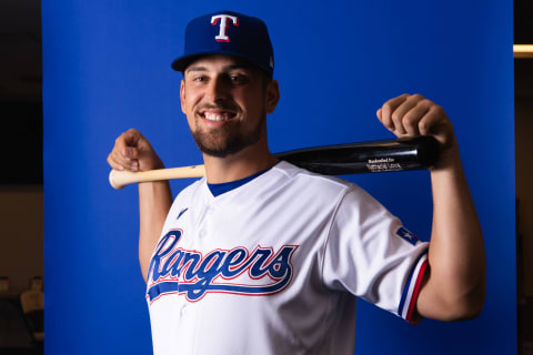 SURPRISE, ARIZONA – MARCH 17: Nathaniel Lowe #30 of the Texas Rangers poses during Photo Day at Surprise Stadium on March 17, 2022 in Surprise, Arizona. (Photo by Kelsey Grant/Getty Images)