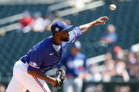 SURPRISE, ARIZONA – MARCH 31: Starting pitcher Taylor Hearn #52 of the Texas Rangers pitches against the Los Angeles Dodgers during the second inning of the MLB spring training game at Surprise Stadium on March 31, 2022 in Surprise, Arizona. (Photo by Christian Petersen/Getty Images)