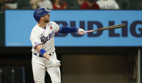 ARLINGTON, TEXAS – MAY 30: Mitch Garver #18 of the Texas Rangers doubles in two runs against the Tampa Bay Rays in the sixth inning at Globe Life Field on May 30, 2022 in Arlington, Texas. (Photo by Tim Heitman/Getty Images)