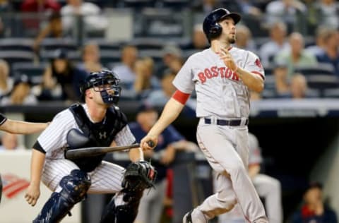 NEW YORK, NY – SEPTEMBER 29: Blake Swihart #23 of the Boston Red Sox hits a two run home run in the eighth inning as Brian McCann #34 of the New York Yankees defends on September 29, 2015 at Yankee Stadium in the Bronx borough of New York City. (Photo by Elsa/Getty Images)