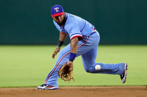 ARLINGTON, TX – JULY 08: Elvis Andrus of the Texas Rangers fields a ground ball against the Los Angeles Angels in the top of the sixth inning at Globe Life Park in Arlington on July 8, 2017 in Arlington, Texas. (Photo by Tom Pennington/Getty Images)