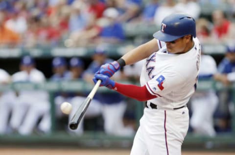 ARLINGTON, TX – SEPTEMBER 2: Shin-Soo Choo #17 of the Texas Rangers makes contact for a double during the first inning of a baseball game against the Los Angeles Angels of Anaheim at Globe Life Park September 2, 2017 in Arlington, Texas. (Photo by Brandon Wade/Getty Images)