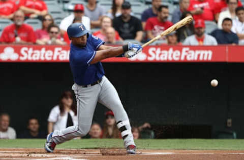 ANAHEIM, CA – SEPTEMBER 17: Elvis Andrus #1 of the Texas Rangers hits a ground ball to third during the first inning of the MLB game against the Los Angeles Angels of Anaheim at Angel Stadium of Anaheim on September 17, 2017 in Anaheim, California. The Rangers defeated the Angels 4-2. (Photo by Victor Decolongon/Getty Images)