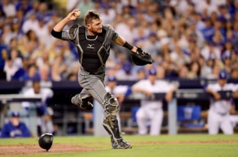 LOS ANGELES, CA – OCTOBER 06: Catcher Jeff Mathis #2 of the Arizona Diamondbacks throws the ball to second base in the third inning against the Los Angeles Dodgers in game one of the National League Division Series at Dodger Stadium on October 6, 2017 in Los Angeles, California. (Photo by Harry How/Getty Images)