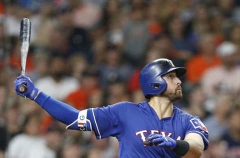 HOUSTON, TX – APRIL 13: Joey Gallo #13 of the Texas Rangers hits a home run in the seventh inning against the Houston Astros at Minute Maid Park on April 13, 2018 in Houston, Texas. (Photo by Bob Levey/Getty Images)