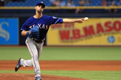 ST PETERSBURG, FL – APRIL 18: Alex Claudio #58 of the Texas Rangers pitches during a game against the Tampa Bay Rays at Tropicana Field on April 18, 2018 in St Petersburg, Florida. (Photo by Mike Ehrmann/Getty Images)