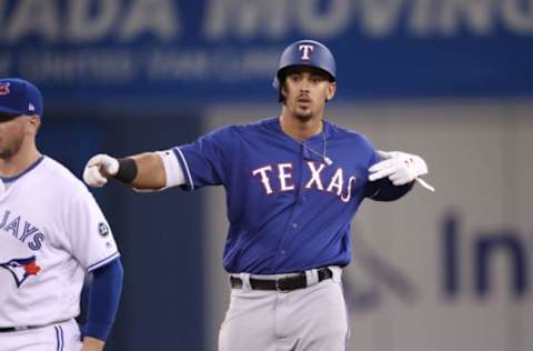 TORONTO, ON – APRIL 27: Ronald Guzman #67 of the Texas Rangers reacts after hitting a double in the eighth inning during MLB game action against the Toronto Blue Jays at Rogers Centre on April 27, 2018 in Toronto, Canada. (Photo by Tom Szczerbowski/Getty Images)