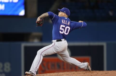 TORONTO, ON – APRIL 27: Keone Kela #50 of the Texas Rangers delivers a pitch in the ninth inning during MLB game action against the Toronto Blue Jays at Rogers Centre on April 27, 2018 in Toronto, Canada. (Photo by Tom Szczerbowski/Getty Images)