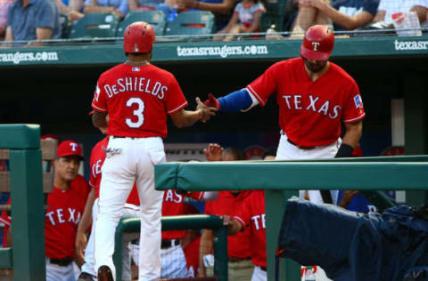 ARLINGTON, TX – MAY 25: Joey Gallo #13 of the Texas Rangers congratulates Delino DeShields #3 for scoring in the third inning against the Kansas City Royals at Globe Life Park in Arlington on May 25, 2018 in Arlington, Texas. (Photo by Rick Yeatts/Getty Images)