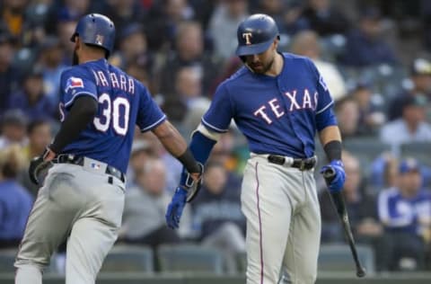 SEATTLE, WA – MAY 30: Nomar Mazara #30 of the Texas Rangers is congratulated by Joey Gallo #13 of the Texas Rangers after scoring on a triple by Jurickson Profar #19 of the Texas Rangers off of starting pitcher James Paxton #65 of the Seattle Mariners during the fourth inning of game at Safeco Field on May 30, 2018 in Seattle, Washington. (Photo by Stephen Brashear/Getty Images)