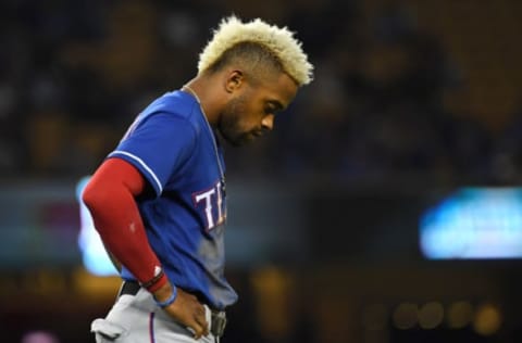 LOS ANGELES, CA – JUNE 13: Delino DeShields #3 of the Texas Rangers stands on the field after he lines out with a runner on base to end the ninth inning of the game against the Los Angeles Dodgers at Dodger Stadium on June 13, 2018 in Los Angeles, California. (Photo by Jayne Kamin-Oncea/Getty Images)