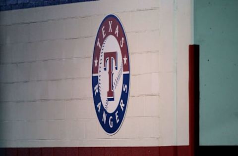 ARLINGTON, TX – OCTOBER 15: A detail of the Texas Rangers logo painted on the wall outside the locker room is seen against the New York Yankees in Game One of the ALCS during the 2010 MLB Playoffs at Rangers Ballpark in Arlington on October 15, 2010 in Arlington, Texas. (Photo by Ronald Martinez/Getty Images)