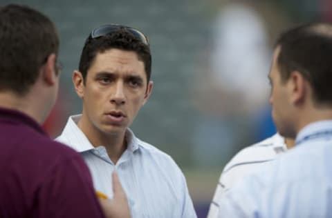 ARLINGTON, TX – OCTOBER 5: General Manager Jon Daniels of the Texas Rangers speaks with members of the press before the American League Wild Card game between the Texas Rangers and the Baltimore Orioles on October 5, 2012 at the Rangers Ballpark in Arlington, Texas. (Photo by Cooper Neill/Getty Images)