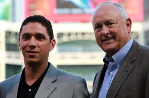 ARLINGTON, TX – APRIL 07: (L-R) Jon Daniels, general manager and Nolan Ryan, CEO and president of the Texas Rangers at Rangers Ballpark in Arlington on April 7, 2012 in Arlington, Texas. (Photo by Ronald Martinez/Getty Images)