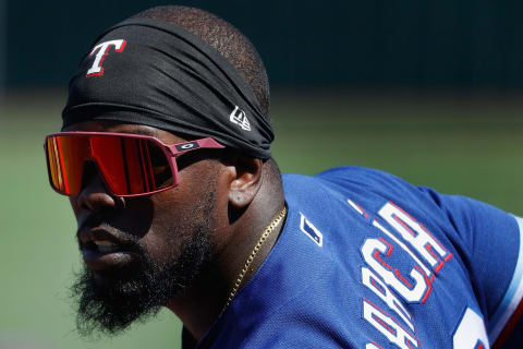 SURPRISE, ARIZONA – MARCH 09: Adolis Garcia #53 of the Texas Rangers watches from the dugout before the MLB spring training game against the Cleveland Indians on March 09, 2021 in Surprise, Arizona. (Photo by Christian Petersen/Getty Images)