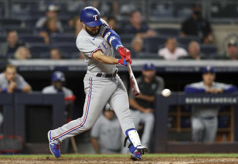 NEW YORK, NEW YORK – SEPTEMBER 20: Isiah Kiner-Falefa #9 of the Texas Rangers connects on a fifth inning RBI double against the New York Yankees at Yankee Stadium on September 20, 2021 in the Bronx borough of New York City. (Photo by Jim McIsaac/Getty Images)