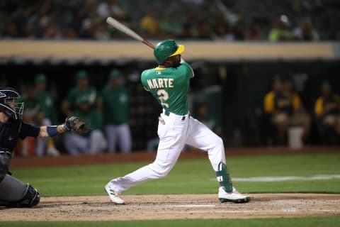 OAKLAND, CA – SEPTMEBER 21: Starling Marte #2 of the Oakland Athletics hits a home run during the game against the Seattle Mariners at RingCentral Coliseum on September 21, 2021 in Oakland, California. The Mariners defeated the Athletics 5-2. (Photo by Michael Zagaris/Oakland Athletics/Getty Images)