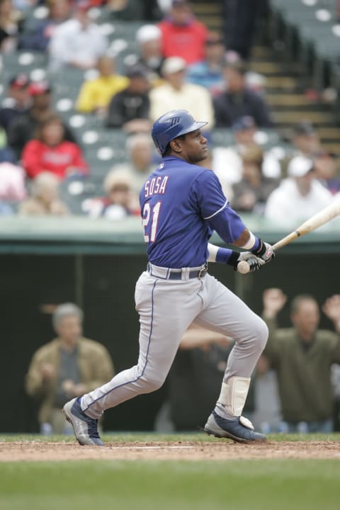 CLEVELAND – APRIL 26: Sammy Sosa of the Texas Rangers hits the first of his two home runs during the game against the Cleveland Indians at Jacobs Field in Cleveland, Ohio on April 26, 2007. The Indians defeated the Rangers 9-4. Sosa’s home run marked the 44th major league ballpark in which he had hit a home run, setting a new major league record. (Photo by John H. Reid III/MLB Photos via Getty Images)