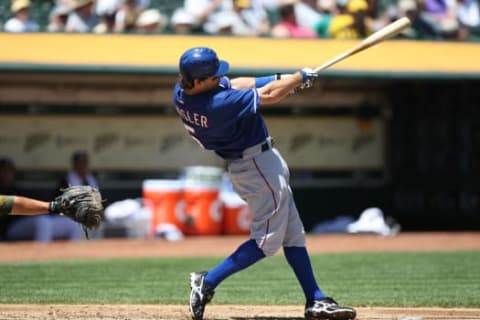 OAKLAND, CA – MAY 07: Ian Kinsler #5 of the Texas Rangers bats against the Oakland Athletics during a Major League Baseball game on May 7, 2009 at the Oakland Coliseum in Oakland, California. (Photo by Jed Jacobsohn/Getty Images)