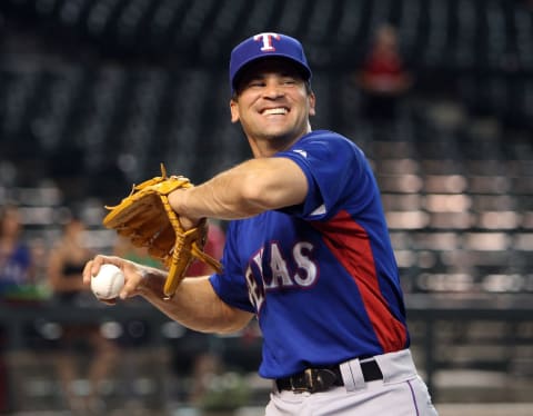 PHOENIX – JUNE 23: Omar Vizquel #13 of the Texas Rangers warms up before the major league baseball game against the Arizona Diamondbacks at Chase Field on June 23, 2009 in Phoenix, Arizona. The Diamondbacks defeated the Rangers 8-2. (Photo by Christian Petersen/Getty Images)