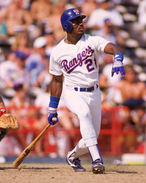 ARLINGTON, TEXAS – 1989: Ruben Sierra of the Texas Rangers bats during an MLB game at Arlington Stadium in Arlington, Texas during the 1989 season. (Photo by Ron Vesely/MLB Photos via Getty Images)