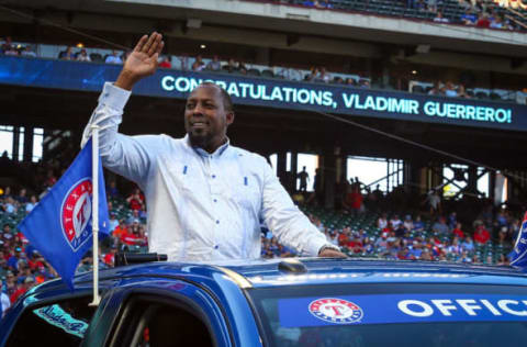 ARLINGTON, TX – AUGUST 04: Former Texas Ranger Vladimir Guerrero, who was recently incucted into the Baseball Hall of Fame, waves as he leaves the field after being honored at a ceremony before the baseball game against the Baltimore Orioles at Globe Life Park in Arlington on August 4, 2018 in Arlington, Texas. (Photo by Richard Rodriguez/Getty Images)