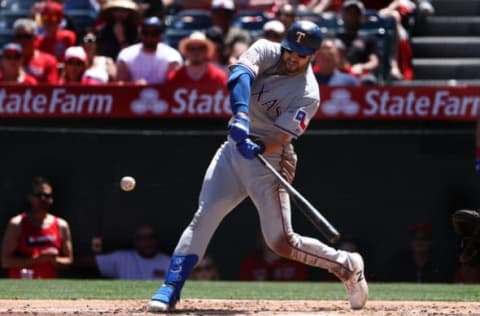 ANAHEIM, CALIFORNIA – APRIL 07: Joey Gallo #13 of the Texas Rangers swings at a pitch in the second inning during the MLB game against the Los Angeles Angels of Anaheim at Angel Stadium of Anaheim on April 07, 2019 in Anaheim, California. Gallo hit the pitch for a two-run homerun. (Photo by Victor Decolongon/Getty Images)