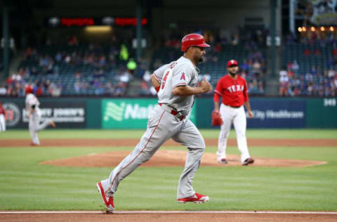 ARLINGTON, TX – APRIL 10: Albert Pujols #5 of the Los Angeles Angels scores a run in the first inning against the Texas Rangers at Globe Life Park in Arlington on April 10, 2018 in Arlington, Texas. (Photo by Ronald Martinez/Getty Images)