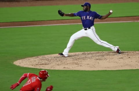 ARLINGTON, TX – SEPTEMBER 05: C.D. Pelham #64 of the Texas Rangers throws against the Los Angeles Angels in the seventh inning at Globe Life Park in Arlington on September 5, 2018 in Arlington, Texas. (Photo by Ronald Martinez/Getty Images)